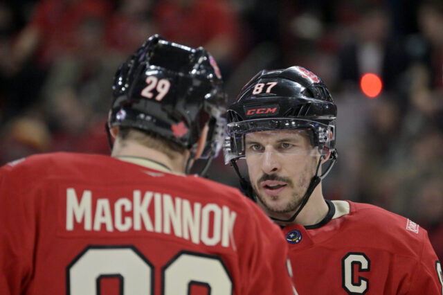 Sidney Crosby looks at Nathan MacKinnon during a game for Team Canada at the 4 Nations Face-Off.