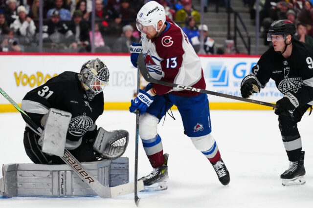 Los Angeles Kings goaltender Anton Forsberg (31) makes a save on Colorado Avalanche right wing Valeri Nichushkin (13) in the second period at Ball Arena.
