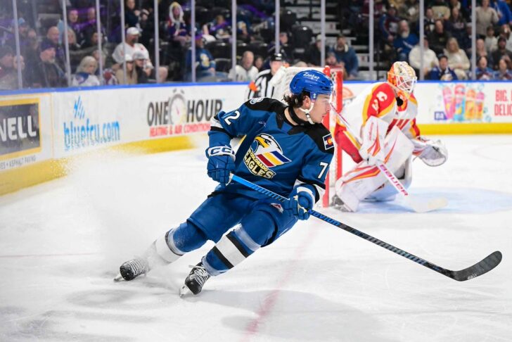 Alex Barré-Boulet skates around the Calgary Wranglers' net.